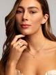 18K Rose Gold Earrings with Pear Shaped Outline and Diamonds - Image 5