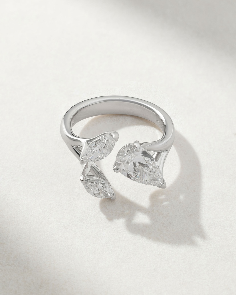 18K White Gold Ring with Pear Shaped and Marquise Diamonds - Image 2
