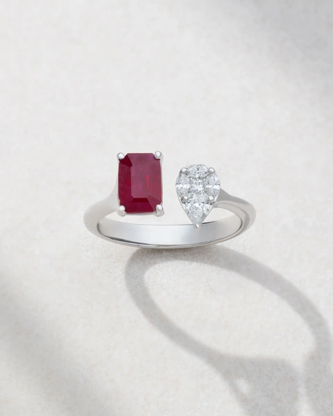Ring in 18K White Gold with Pear, Marquise and Princess Cut Diamonds and an Emerald Cut Ruby
