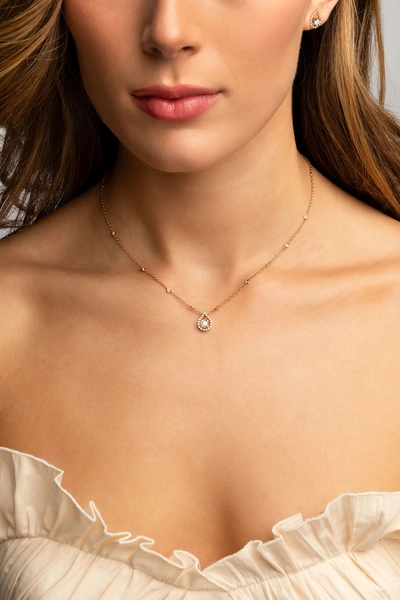 18K Rose Gold Earrings with Pear Shaped Outline and Diamonds
