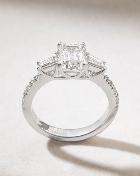 Engagement Ring in 18K White Gold with Emerald, Baguette and Brilliant Diamonds