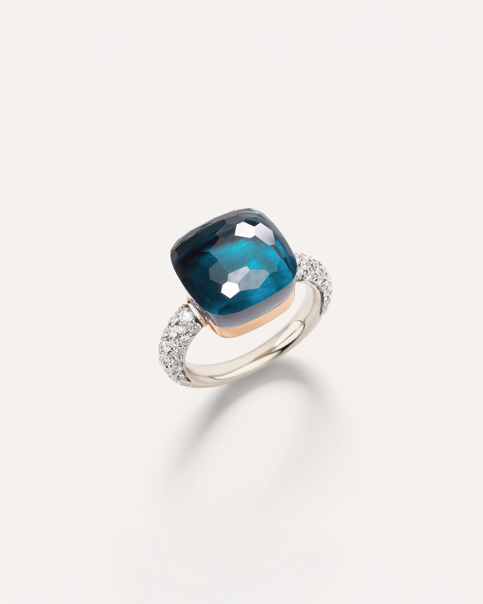 Nudo ring in 18k white and rose gold  with london blue topaz (≈15 cts) and  white diamonds