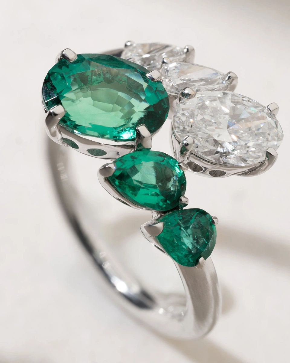 18K White Gold Ring with Oval and Pear Shaped Diamonds and Emeralds