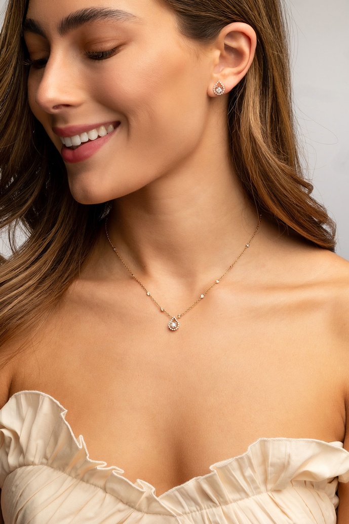 18K Rose Gold Earrings with Pear Shaped Outline and Diamonds - Image 4