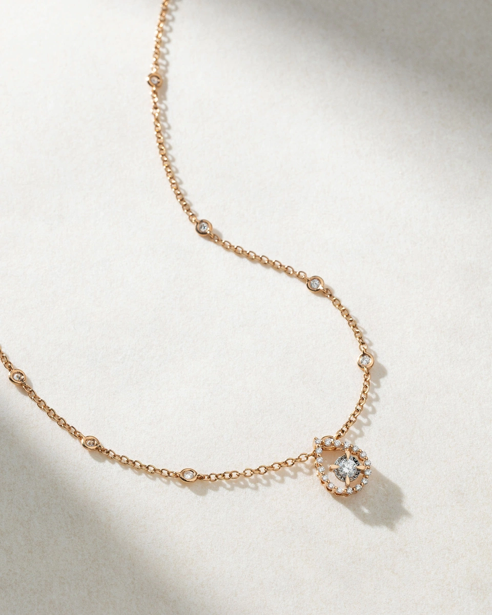 18K Rose Gold Necklace with a Pear Shaped Pendant and Brilliant Diamonds