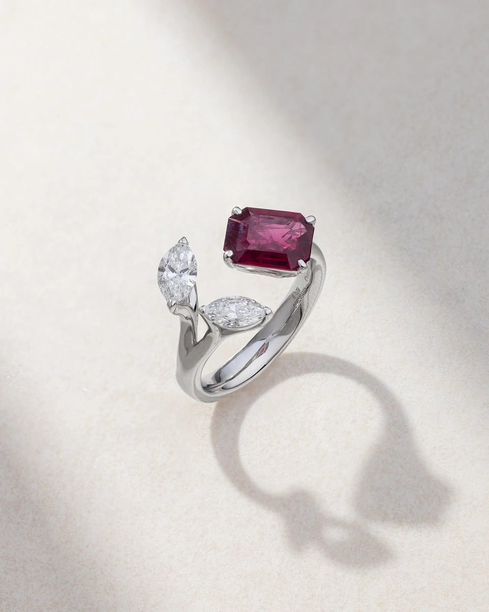 Ring in 18K White Gold with Navette Diamonds and an Emerald Cut Ruby