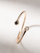 18K Rose Gold Ring with a Black and a White Diamond