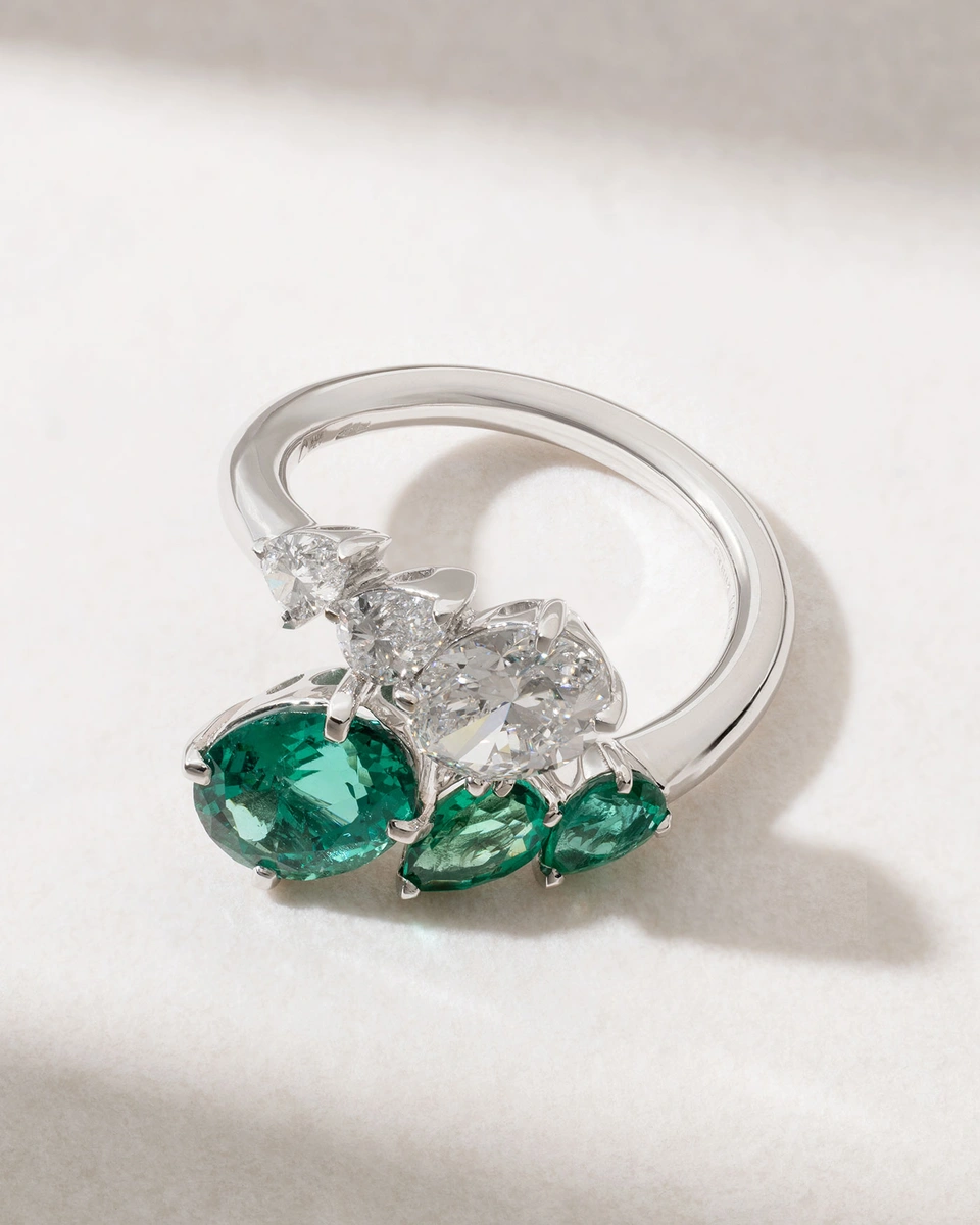 18K White Gold Ring with Oval and Pear Shaped Diamonds and Emeralds