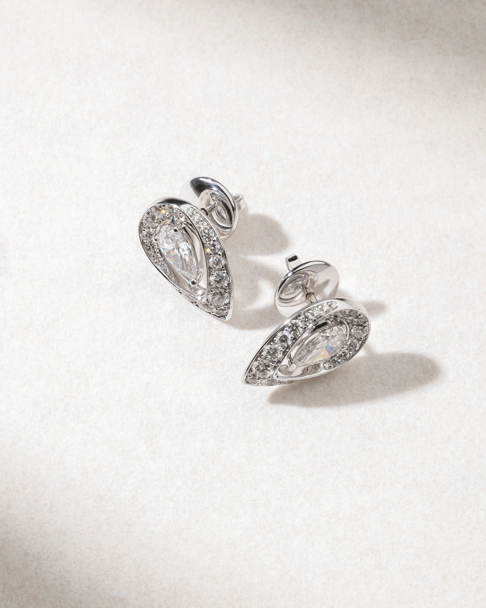 18K White Gold  Studs with Pear shaped and Brilliant Diamonds