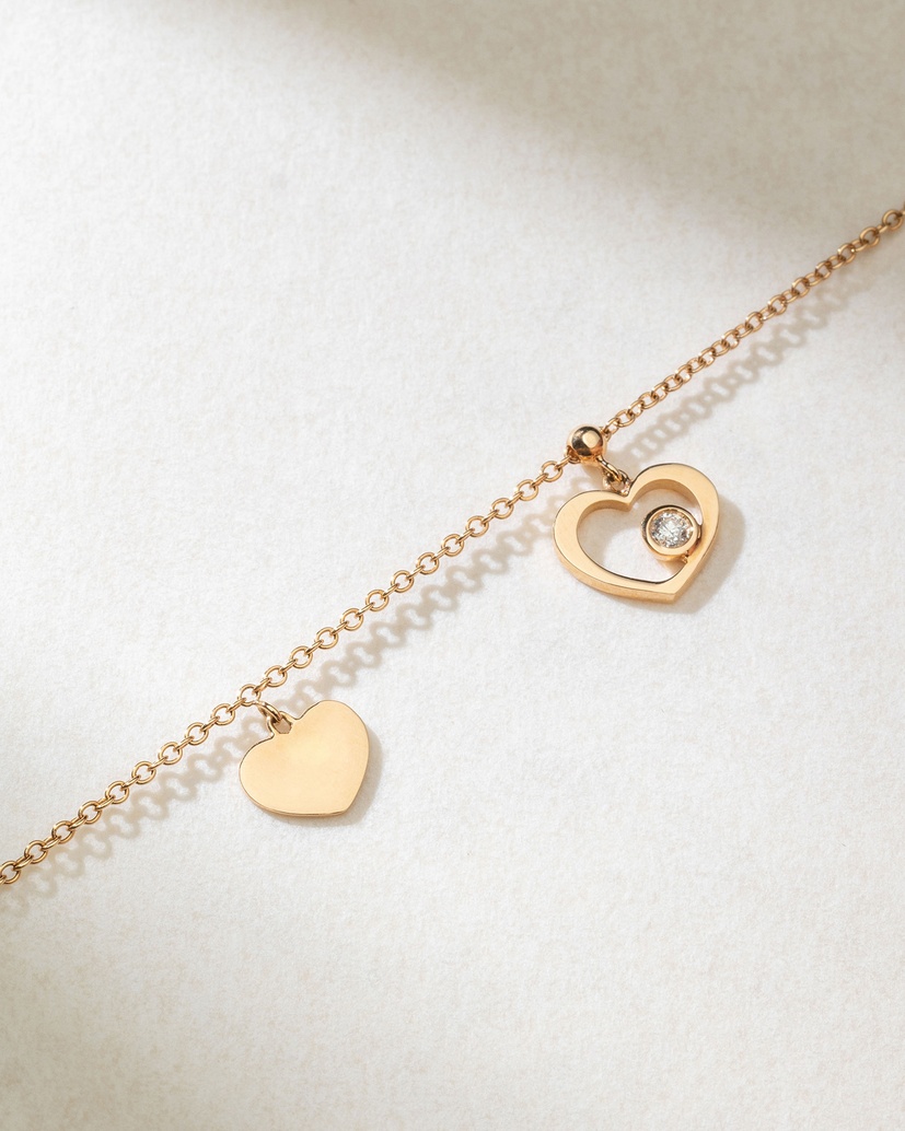 18 K Rose Gold Bracelet with Hearts and a Diamond