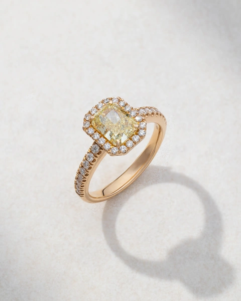 Ring in 18K Rose Gold with Radiant Fancy Yellow Diamond and Brilliant Cut Diamonds