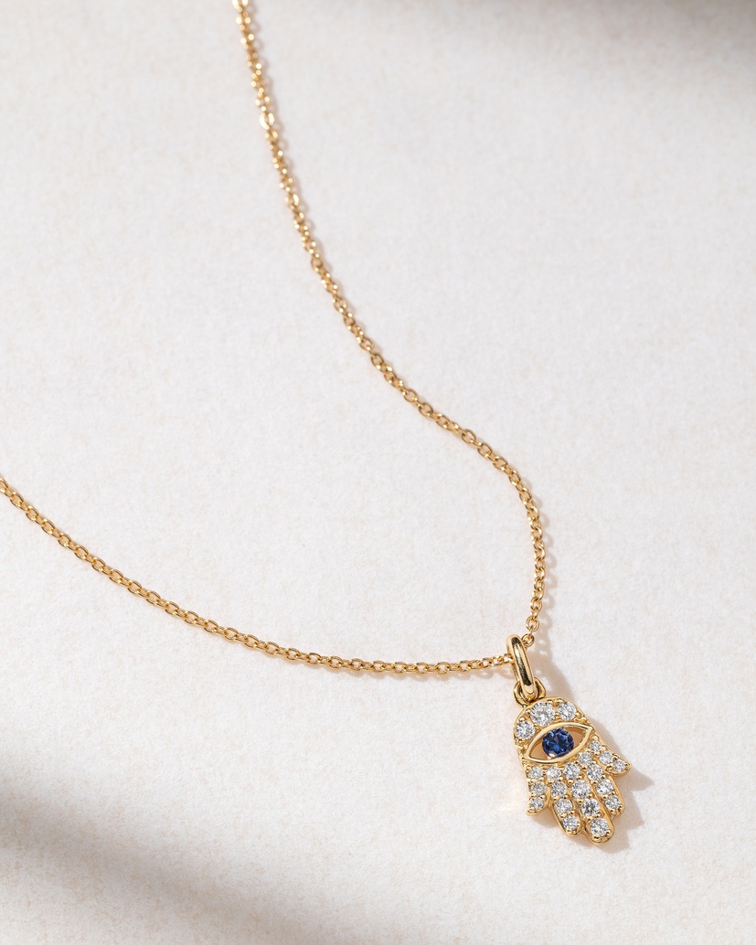 18K Yellow Gold Hand of Fatima with Diamonds and Sapphire - Image 1
