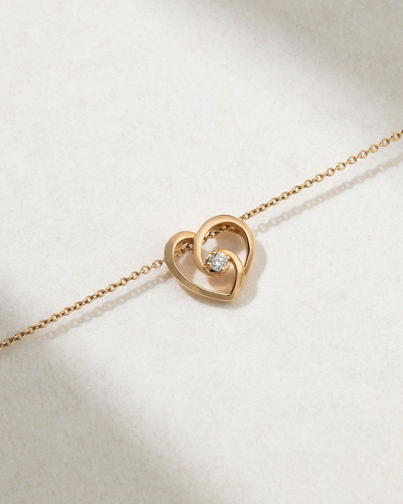 18K Rose Gold Heart Swirl Necklace with a Diamond